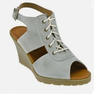 Dr. Martens Laina leather wedge peep toe sandals with tie and buckle closure